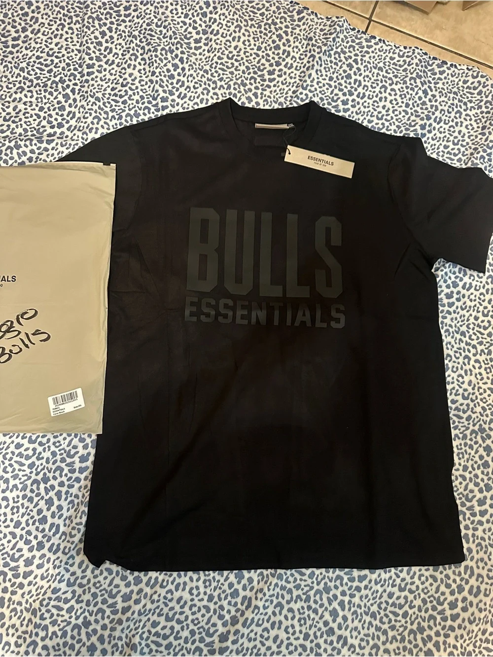 Essentials Black Crewneck Tee with Subtle Graphic
